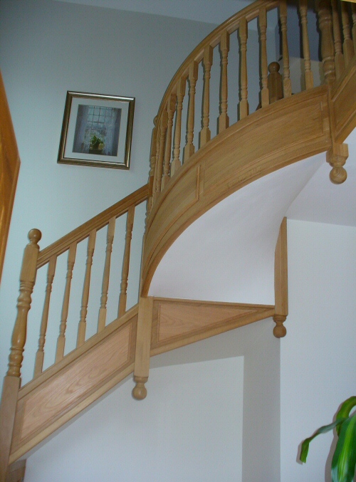 Circular Section Oak Staircase - With circular raised and fielded panels