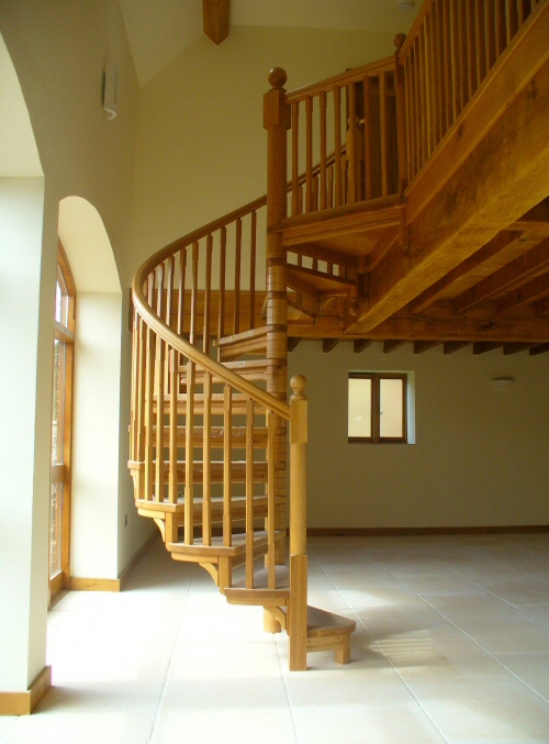 Spiral staircase in stained oak